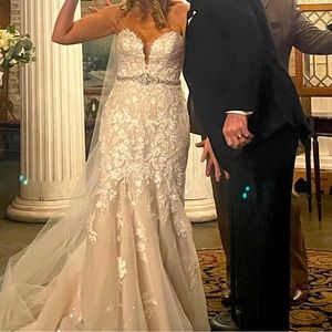 Designer Wedding Dress-sold out! Size 6 includes belt + Chapel veil.